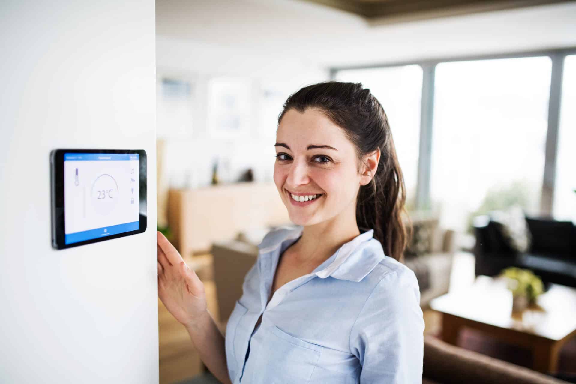 Woman using smart home system in Gold Coast