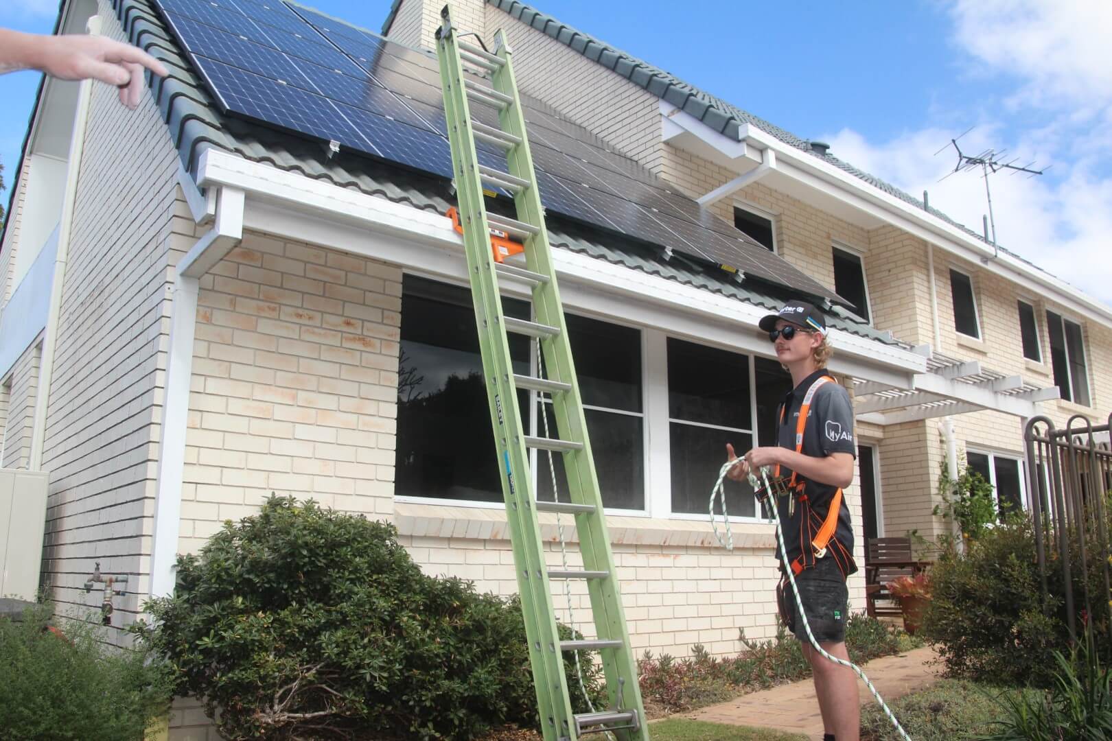 solar-panel-electrician-on-roof (4) solar power brisbane installation