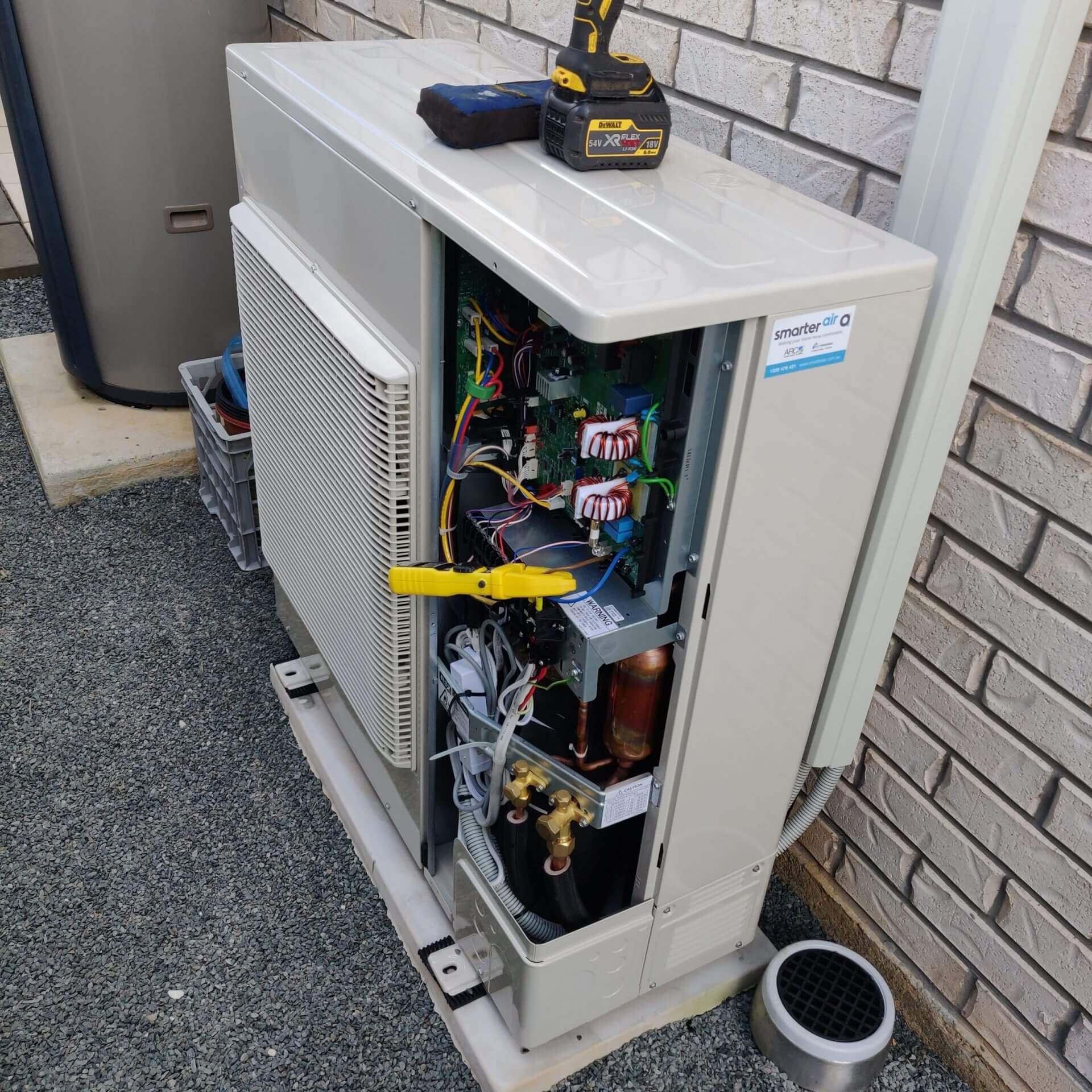 Man working on air conditioning unit